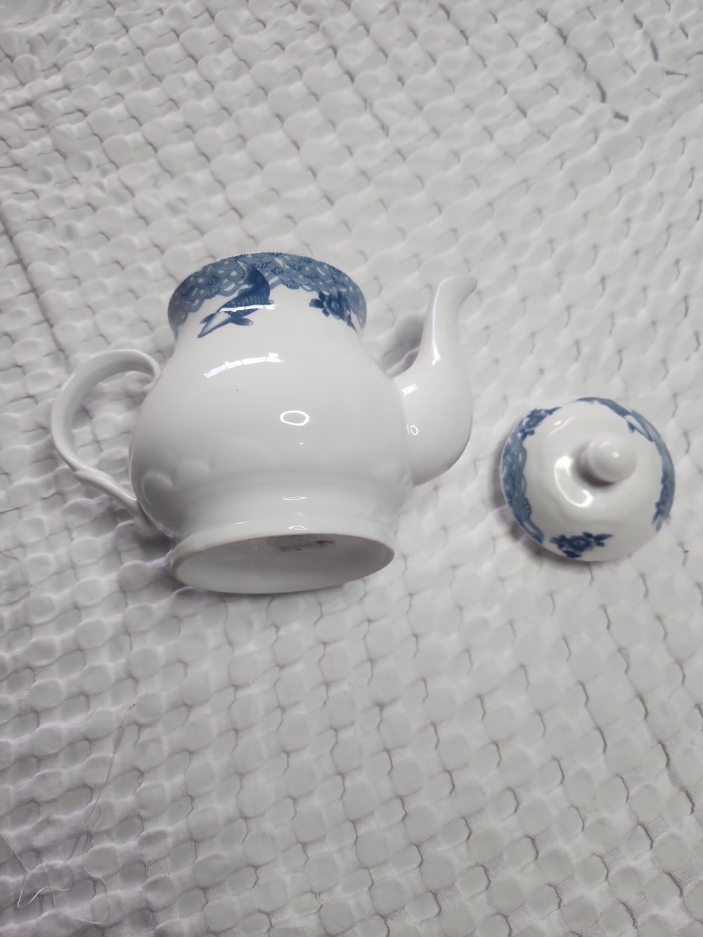 Classic White Porcelain Teapot with Blue Floral Trim